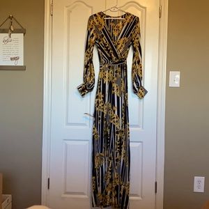 Long palazzo  suit . New, used once for a photo shoot. Deep V